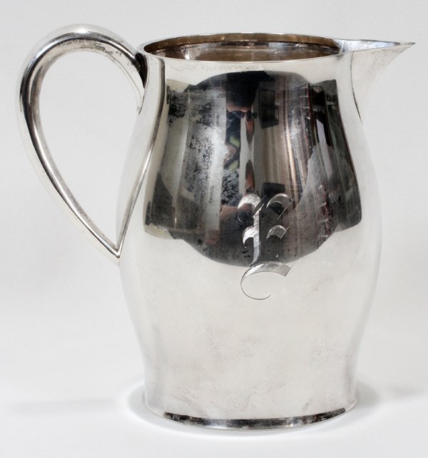 TUTTLE STERLING SILVER WATER PITCHER 20 TROY OZ: TUTTLE STERLING SILVER WATER PITCHER 20 TROY OZ, 4 1/2 PINTS, H 8", DIA 8":20 - Troy Oz. Simple Plain Look. Paul Reveres style. Good Condition. #210 - A "E" monogram. Tuttle Silversmiths, Boston, now 