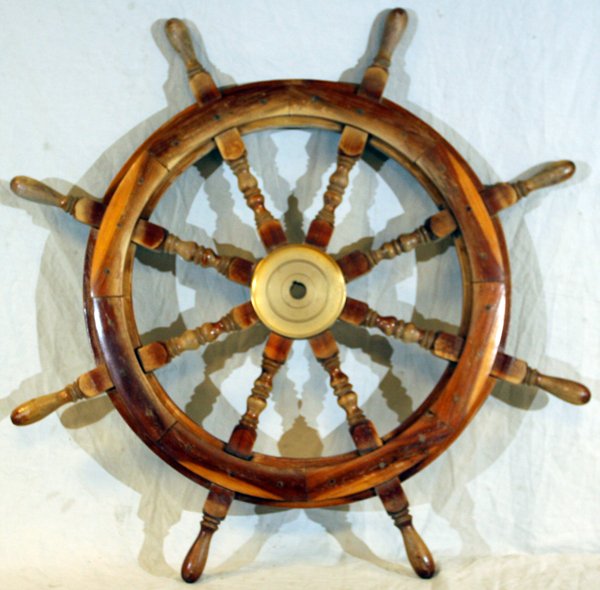 WOOD AND BRASS SHIP'S WHEEL, DIA 36": WOOD AND BRASS SHIP'S WHEEL, DIA 36":having turned spindle spokes with handles, and brass center hub.