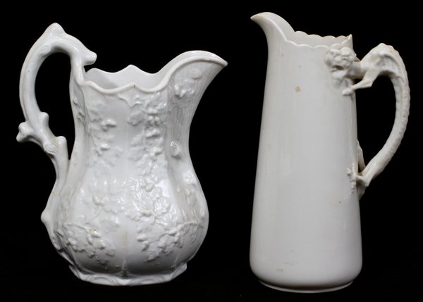 BENNINGTON PARIAN & WILLETS-BELLEEK PITCHERS: BENNINGTON PARIAN & WILLETS-BELLEEK PORCELAIN PITCHERS, MID TO LATE 19TH CENTURY, TWO, H 8" & 9":Including 1 Bennington Parian pitcher in the "Charter Oak" pattern, H. 9", together with 1 Belleek Will
