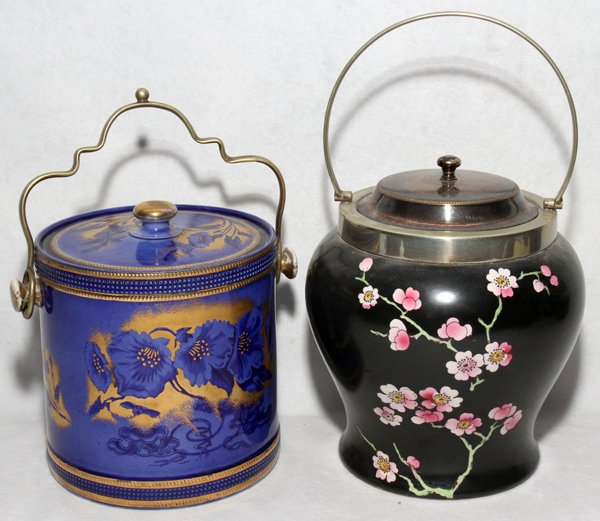 ENGLISH PORCELAIN & SILVER PLATE BISCUIT BARREL: ENGLISH PORCELAIN & SILVER PLATE BISCUIT BARRELS, TWO, H 9" & 11":Including 1 S.F. & Co. Crown Devon biscuit barrel with blue and gold floral motif and 1 Rialto Ware biscuit barrel. Both with silver p