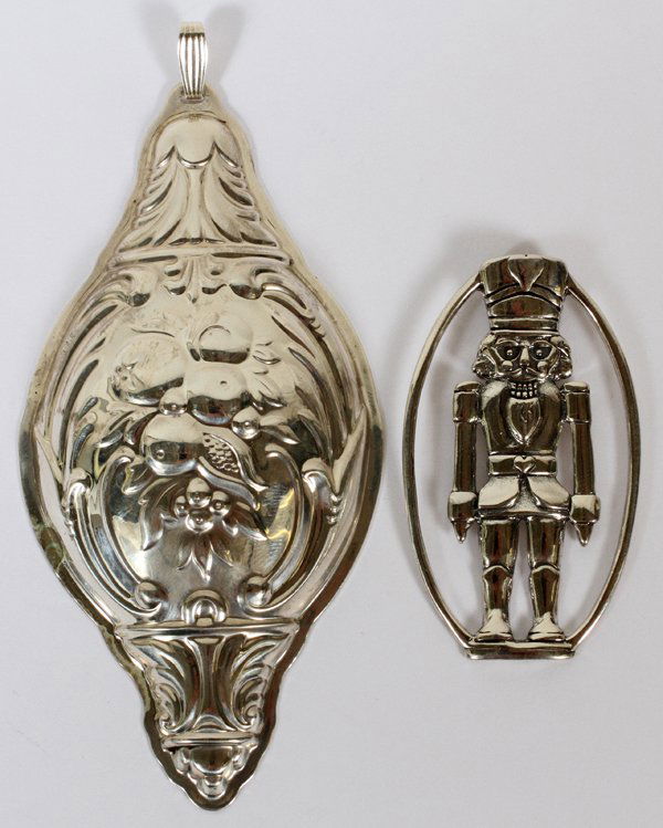 STERLING CHRISTMAS ORNAMENTS, TWO, L 2" & 4": STERLING CHRISTMAS ORNAMENTS, TWO, L 2" & 4":Including 1 of a Nutcracker stamped "925 H & H de Matteo" and 1 "Francis I" by Reed & Barton (sixth edition). Totaling approximately 0.99 trz.