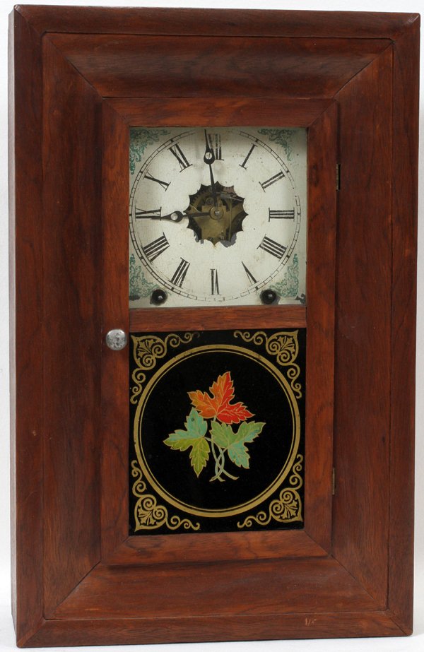 NEW HAVEN CLOCK CO. MAHOGANY EMPIRE CLOCK,: NEW HAVEN CLOCK CO. MAHOGANY EMPIRE CLOCK, H 19", W 12", D 4":Ogee mahogany case. Eglomise reverse painting under glass. Circa 1950.