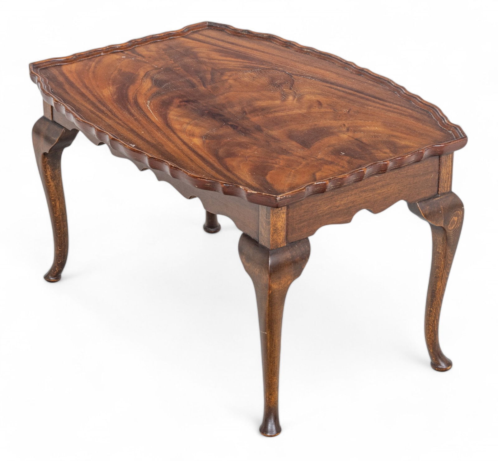 American Queen Ann Style Flame Grain Mahogany Table, Ca. 1940: American Queen Ann Style Flame Grain Mahogany Table, Ca. 1940 The tabletop surface having a bookmatched mahogany veneer. Having a scalloped apron, terminating on cabriole legs on pad form feet. Proven
