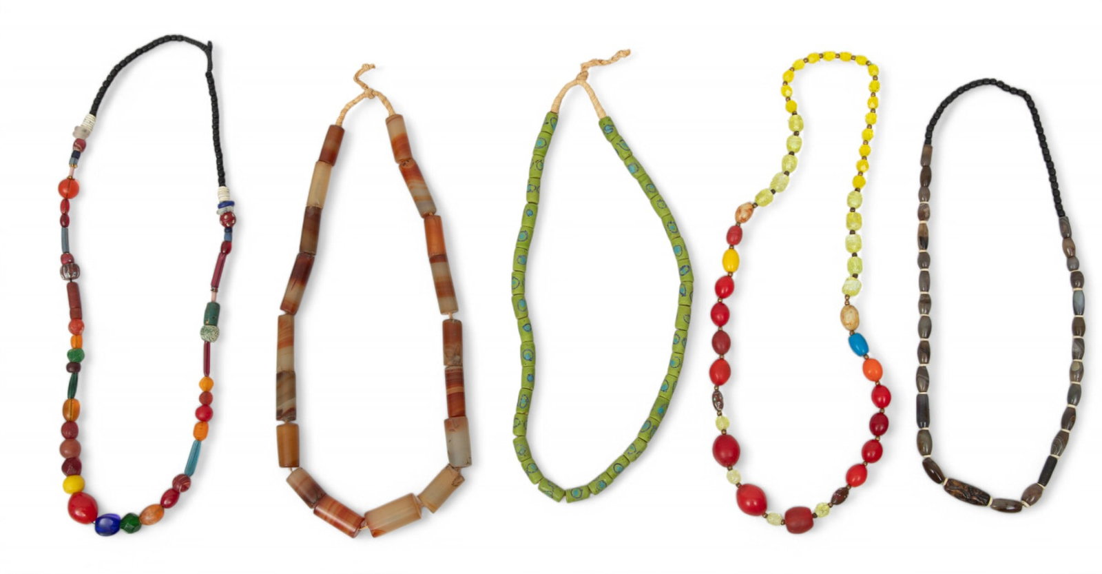 African Trade Bead Necklace Grouping L 25": African Trade Bead Necklace Grouping L 25" The trade bead necklaces are comprised of stone beads, multi-colored blown glass beads, bone, and plastic beads. Provenance: Property from a Bloomfield Towns