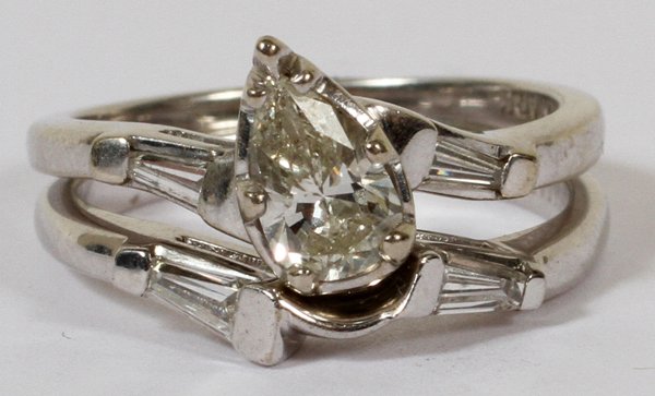 14KT W/GOLD & DIAMOND ENGAGEMENT/ BAND SET,: 14KT WHITE GOLD AND DIAMOND ENGAGEMENT AND WEDDING BAND SET, C 1967, 2 PCS.:having a 14kt white gold engagement ring with three diamonds, one teardrop cut (0.34cts) and two tapered baguettes (0.16ctw)