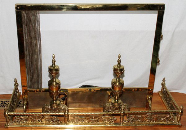 BRASS FIREPLACE FENDER, SCREEN & PAIR OF ANDIRONS: BRASS FIREPLACE FENDER, SCREEN & PAIR OF ANDIRONS, FOUR PIECES:Including 1 fender, H.7" x 48"x 16", 1 screen, H.31", and a pair of andirons, H.20". Twentieth century.