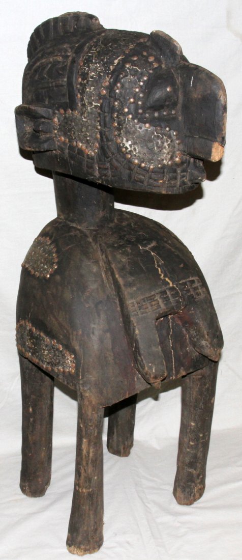 ANTIQUE AFRICAN CARVED WOOD FEMALE FIGURE H 42": ANTIQUE AFRICAN CARVED WOOD FEMALE FIGURE, H 42", W 14", D 19":tin nail ornaments upon face & body;