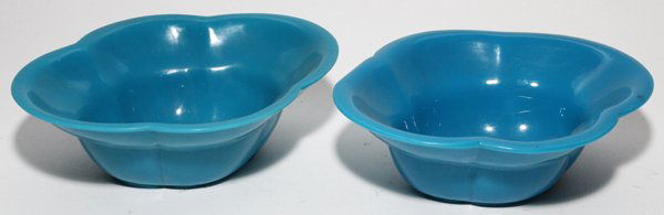 CHINESE PEKING GLASS BOWLS, PAIR, L 7 7/8": CHINESE PEKING GLASS BOWLS, PAIR, L 7 7/8":Each is of quatrefoil shape and medium blue in color. Measuring H.2 1/2" x 7 7/8" x 6 1/4". Pre 1920.