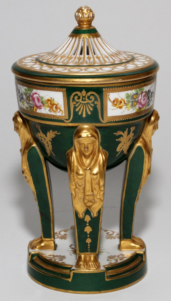 SEVRES, FRENCH PORCELAIN COVERED URN, H 8",: SEVRES, FRENCH PORCELAIN COVERED URN, H 8", DIA 4 1/2":Pierced cover raised on four caryatid supports on a round base; marked at the underside "M. Imple de Sevres" (see photo). Deep green ground, Four