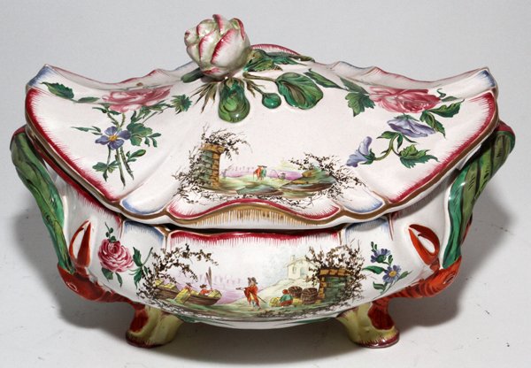 FAIENCE COVERED SERVING DISH, H 6", L 11": FAIENCE COVERED SERVING DISH, H 6", L 11":Floral knob centers the cover, flanked by molded branch-form handles, a molded lobster at each foot.