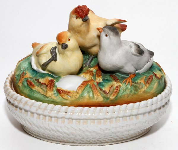 ENGLISH STAFFORDSHIRE CHICKS TUREEN/COVERED BOWL,: ENGLISH STAFFORDSHIRE NESTING CHICKS TUREEN/COVERED BOWL, 19TH C., H 7 1/2", W 9":Oval shape, hen and two chicks at the cover, molded basket weave about the base.