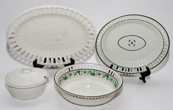 WEDGWOOD & CREIL CREAMWARE BASKETS AND TRAYS,: WEDGWOOD & CREIL CREAMWARE BASKETS AND TRAYS, 19TH C., FOUR PIECES, L 6"-13":Including 1 basket-form covered sauce tureen, impressed "Wedgwood Etruria"; 1 basket on 1 matching stand, both impressed "W