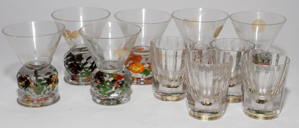 GLASS PAPERWEIGHT-BASE WINES & SHOT GLASSES: GLASS PAPERWEIGHT-BASE WINES (6), & SHOT GLASSES (4):A set of 6 wine glasses with faceted bases, gilt motif of fighting cocks, H.3 3/4", together with a set of 4 colorless shot glasses with roosters a