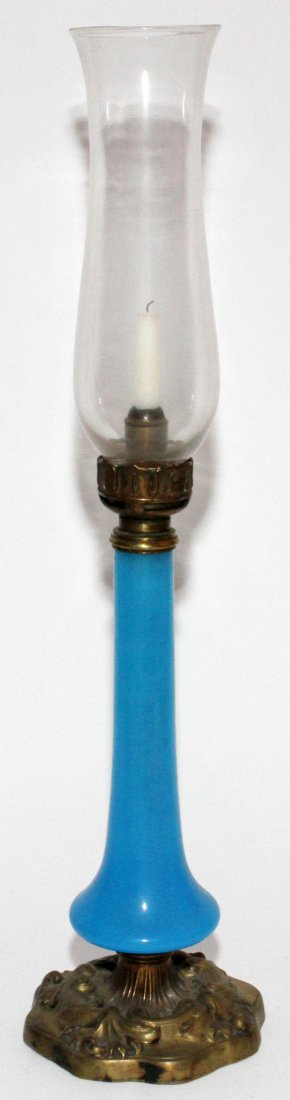 OPALINE GLASS CANDLE HOLDER WITH BRONZE MOUNTS,: OPALINE GLASS CANDLE HOLDER WITH BRONZE MOUNTS, C. 1850, H 16", 26" OVERALL:Blue opaline glass shaft with bronze collar and foot. Includes a chimney.