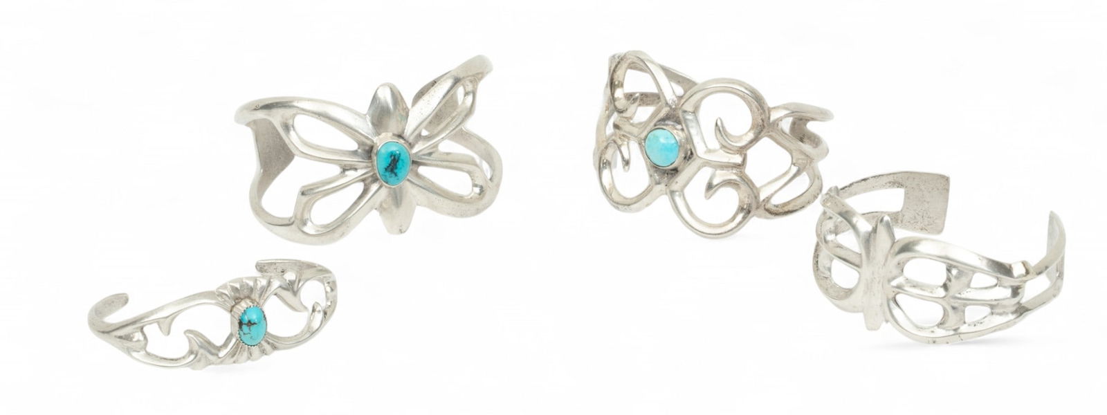 Navajo Sterling Silver And Turquoise Cuff Bracelets W 2.2" 72g 2 PCS: Navajo Sterling Silver And Turquoise Cuff Bracelets W 2.2" 72g 2 PCS One bracelet 2.2" wide, other 2.5" wide. Polished cabochon blue turquoise embellishments. Hand made. Provenance: Property of