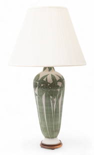 Art Nouveau Style Glazed Ceramic Iris Table Lamp H 36" Dia. 8": Art Nouveau Style Glazed Ceramic Iris Table Lamp H 36" Dia. 8" Art Nouveau style table lamp decorated with green irises on a white field. Electrified with a single socket. Includes a cloth shade, Dia.