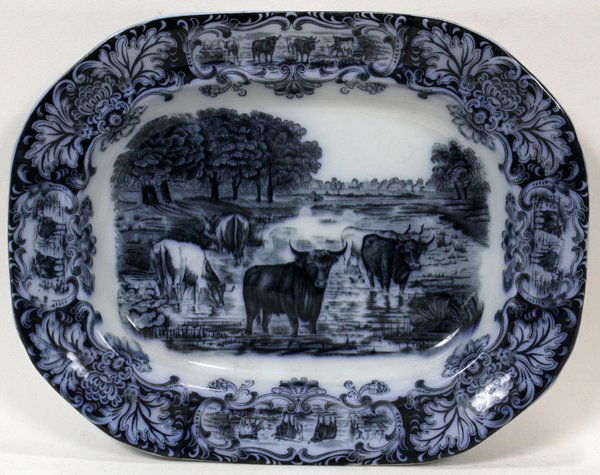 IMPERIAL PORCELAIN FLO BLUE PORCELAIN PLATTER: IMPERIAL PORCELAIN FLO BLUE PORCELAIN PLATTER, L 17", D 13":A landscape scene with steers.