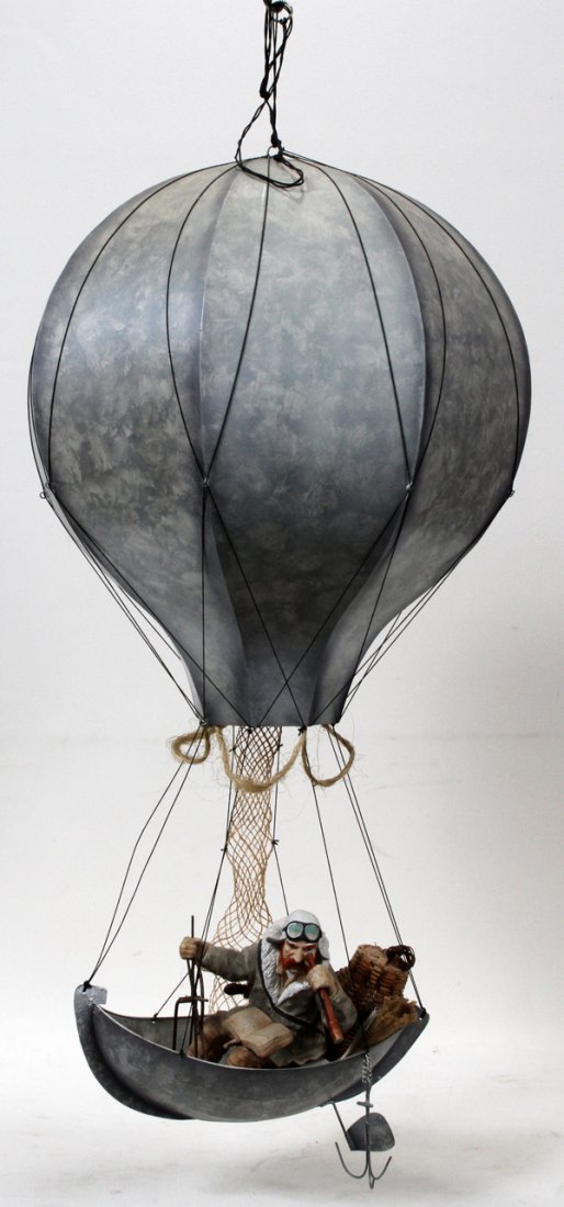 MOBILE MAN IN A HOT AIR BALLOON, H 36": MOBILE MAN IN A HOT AIR BALLOON, H 36":Depicting a man in a boat with a telescope.