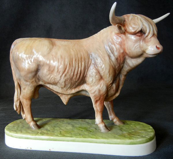 DORIS LINDNER ROYAL WORCESTER MODEL HYLAND BULL: DORIS LINDNER ROYAL WORCESTER WORKING MODEL HYLAND BULL, H 7", L 9":Tan in color.