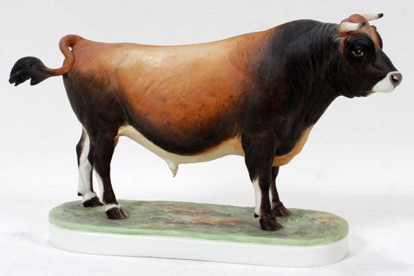 DORIS LINDNER FOR ROYAL WORCESTER JERSEY BULL: DORIS LINDNER FOR ROYAL WORCESTER, PORCELAIN JERSEY BULL, H 7", L 12":Royal Worcester mark, signed and inscribed on underside: "Jersey Bull" Dated 1965. 7 1/2" H. x 12" L.