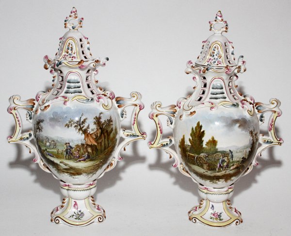 ITALIAN PAINTED DEMI-PORCELAIN COVERED URN,: ITALIAN PAINTED DEMI-PORCELAIN COVERED URN, H 18", W 11", PLUS ONE AS IS:With painted floral spray at one side and figures in an exterior setting at the other. Marked at the underside in blue with dou