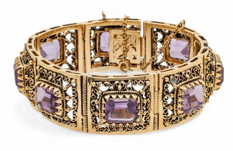14K Yellow Gold And Amethyst Link Bracelet L 6.5" 49 g: 14K Yellow Gold And Amethyst Link Bracelet L 6.5" 49 g Impressed 14K. Eight amethysts, emerald cut @ approx. 1 1/2cts. each, prong set. Provenance:  Property from a Bloomfield Hills, MI private collec