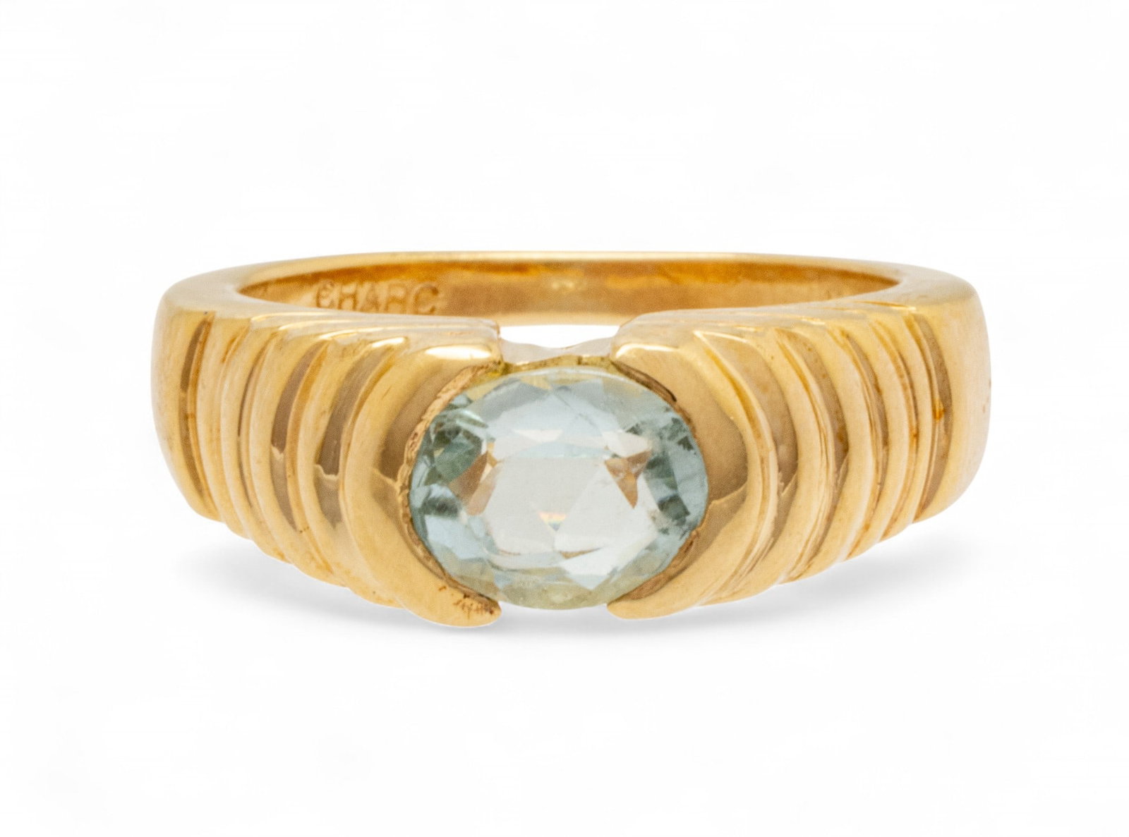 14k Yellow Gold And 1.10ct Aquamarine Ring 5.5: 14k Yellow Gold And 1.10ct Aquamarine Ring 5.5 A simply elegant 1.10ct oval cut aquamarine set in a stepped 14k yellow gold ring. Marked 14k CHARO to interior of the band. Ring size 5.5. Provenance: P