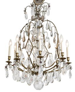 French Rock Crystal And Crystal Eight Light Chandelier 1910-1920, H 33" Dia. 26": French Rock Crystal And Crystal Eight Light Chandelier 1910-1920, H 33" Dia. 26" Rock crystal lozenges alternate with faceted crystals on each arm. Amethyst and clear flower petals and stamen at arm t