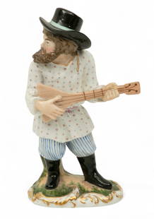 Kornilov Brothers (Russian) Porcelain Figure 'Musician', H 6.75" W 2.25" L 3.75": Kornilov Brothers (Russian) Porcelain Figure 'Musician', H 6.75" W 2.25" L 3.75" Hand painted, glazed, has orange double eagle marking of the Brothers Kornilov. Fire gold accents with a gold scrolling