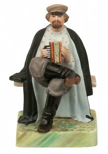 Russian Hand Painted Porcelain Figurine 'Accordian Player', H 6.5" W 5" L 5": Russian Hand Painted Porcelain Figurine 'Accordian Player', H 6.5" W 5" L 5" Accordion player. Hand painted, unglazed, has orange double eagle marking of the&nbsp;Kuznetsov factory mark. Provenance: