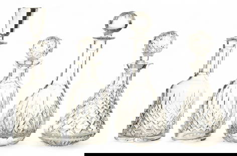 Waterford Crystal Decanters, Group of Three Plus One Additional, H.10.25"-12.75" Dia. 4"-4.5" 4 PCS: Waterford Crystal Decanters, Group of Three Plus One Additional, H.10.25"-12.75" Dia. 4"-4.5" 4 PCS The two smaller are marked Waterford on the underside. The medium is marked Marquis Waterford. The l