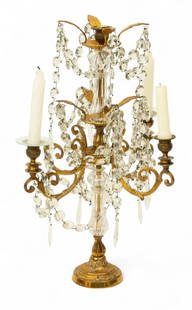 French Gilded Metal And Crystal Five Light Girandole 1900, H 22" Dia. 15": French Gilded Metal And Crystal Five Light Girandole 1900, H 22" Dia. 15" Four arms supporting candle holders branch from center candlestick. Crystal prisms join arms to body.&nbsp; Provenance:  The B