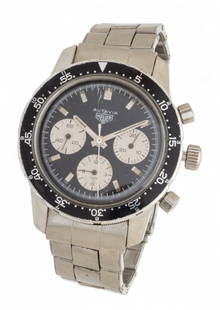 Heuer Autavia Stainless Steel Wrist Watch: Heuer Autavia Stainless Steel Wrist Watch Black dial. Stainless steel band. Dimensions: 1 PC