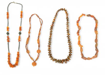 Tribal Amber And Stone Beaded Necklaces H 6" W 5" L 2" 4 PCS: Tribal Amber And Stone Beaded Necklaces H 6" W 5" L 2" 4 PCS Four Tribal beaded necklaces. One necklace of small amber pieces with pearl accents. Torsade style necklace of amber. One necklace with sto
