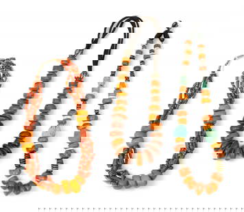 Tribal Amber Beaded Necklaces H 10" W 4" L 2" 3 PCS: Tribal Amber Beaded Necklaces H 10" W 4" L 2" 3 PCS Three, Amber Tribal beaded necklaces. One torsade-style, segmented necklace with branch coral beads with metal hook clasp. Two knotted. Left and cen