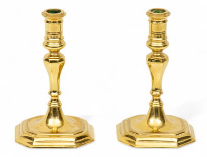 Virginia Metalcrafters Colonial Williamsburg Brass Candlesticks, 20th C., H 7" Dia. 4.5" 1 PAIR: Virginia Metalcrafters Colonial Williamsburg Brass Candlesticks, 20th C., H 7" Dia. 4.5" 1 PAIR On square tiered bases. Impressed on underside with "CW" makers mark and "CW 16-35".&nbsp; Provenance: