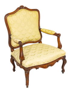 French Louis XV Carved Walnut Armchair, 1770-1780, H 41" W 32" Depth 25": French Louis XV Carved Walnut Armchair, 1770-1780, H 41" W 32" Depth 25" Cabriole legs with carved knees. Cartouche and swag carved frieze. Shield form back with scalloped crest. Fine green upholstere