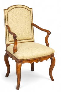 Country French Hand Carved Walnut Armchair 1790: Country French Hand Carved Walnut Armchair 1790 On four cabriole carved legs with carved apron and frieze. Upholstered seat and back in a green linen upholstery. Brass nail head trim.&nbsp; Provenance