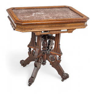 Victorian, Eastlake Movement Carved Walnut Marble Top Parlor Table H 31" W 22.25" L 32.25": Victorian, Eastlake Movement Carved Walnut Marble Top Parlor Table H 31" W 22.25" L 32.25" Rouge marble top. Carved walnut frame with burlwood veneer accents. Pierced apron. Fluted legs with foliate