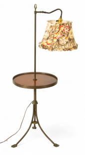 French Brass And Walnut Floor Lamp H 54" Dia. 17": French Brass And Walnut Floor Lamp H 54" Dia. 17" Tripod legs with acanthus leaf feet. Central column and legs decorated with thistle leaves and X patterns. Central walnut table top with brass gallery