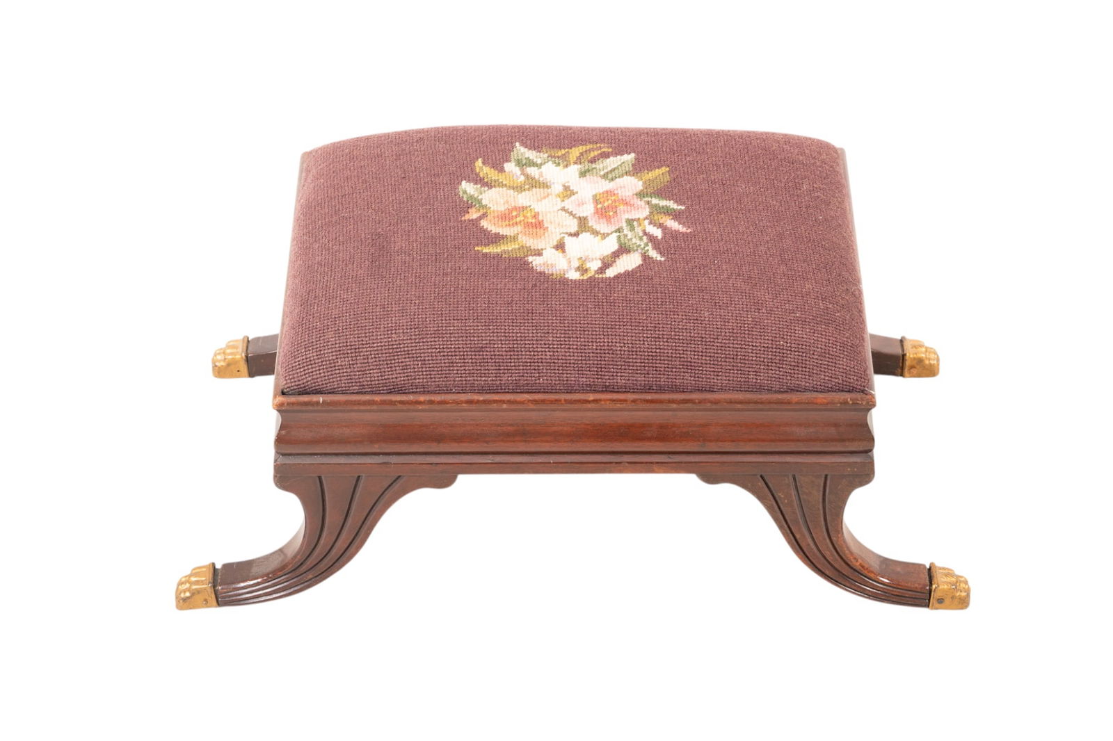 Duncan Phyfe Mahogany & Needlepointe Footstool 1940, H 8" W 11" L 21": Duncan Phyfe Mahogany & Needlepointe Footstool 1940, H 8" W 11" L 21" Brass clad feet. Provenance: Property of a Bloomfield Hills, MI private collector. Dimensions: 1 PC x H 8" W 11" L 21"