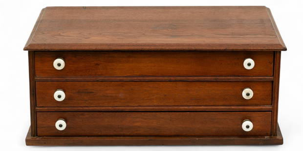 Walnut Three-Drawer Spool Cabinet H 9" W 22" L 14.5": Walnut Three-Drawer Spool Cabinet H 9" W 22" L 14.5" A walnut, three-drawer spool cabinet. Drawers with compartments and white porcelain pull knobs. Drawer depth 1.75" Provenance:  Property from a Mid