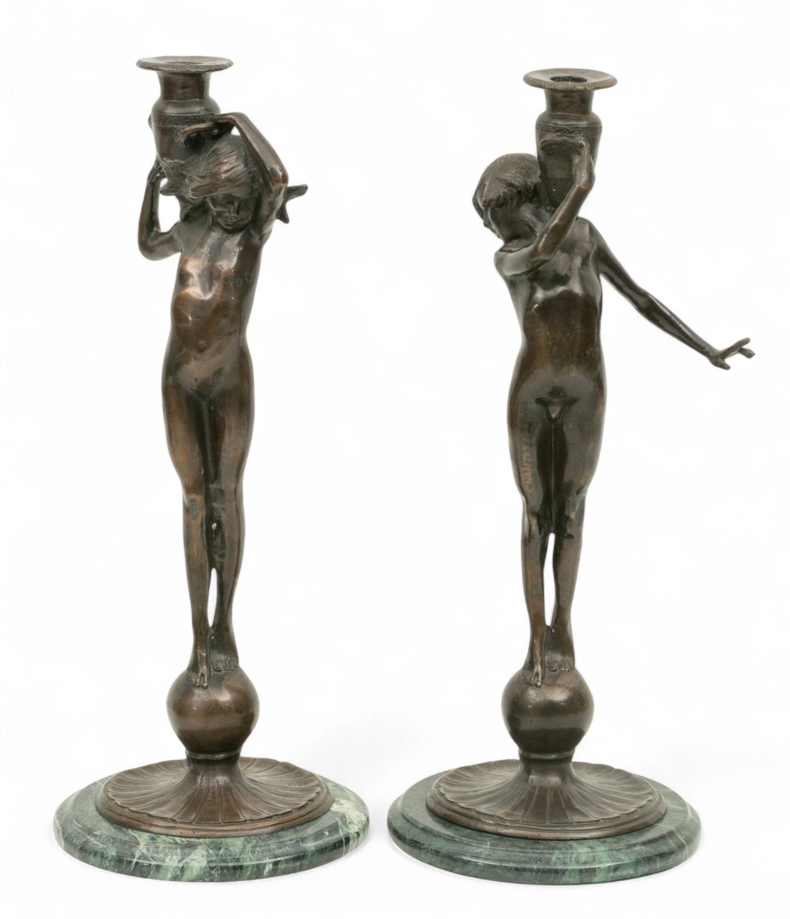 After Edward Francis McCartan (American, 1879-1947) Bronze Candlesticks Late 20th C., 'Female Nudes: After Edward Francis McCartan (American, 1879-1947) Bronze Candlesticks Late 20th C., 'Female Nudes Carrying Amphora', H 16.25" Dia. 7" 1 PAIR Singed on bases. Each mounted on 3/4" round marble plinth