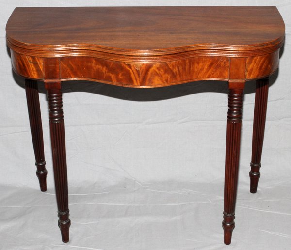 SHERATON MAHOGANY CONSOLE-CARD TABLE, C. 1870: SHERATON MAHOGANY CONSOLE-CARD TABLE, C. 1870, H 29", W 36":D 17 1/2". Hinged to open to square. Reeded and turned spool legs.