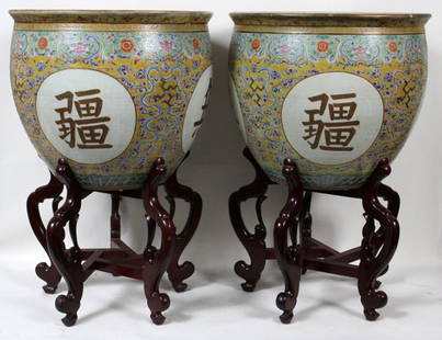 ANTIQUE CHINESE PORCELAIN FISH BOWLS, PAIR: ANTIQUE CHINESE PORCELAIN FISH BOWLS, PAIR, H 18", DIA 21":Featuring four Chinese longevity without boundary characters. Each bowl with wood base.