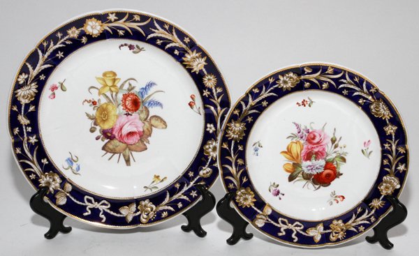 SPODE PORCELAIN PLATES, 19TH C., TWO,: SPODE PORCELAIN PLATES, 19TH C., TWO, DIA 10" & 8":Set of two porcelain plates, each with a colorful floral spray at the well, cobalt blue border with flowering vine motif. Hand lettered "Spode" on re
