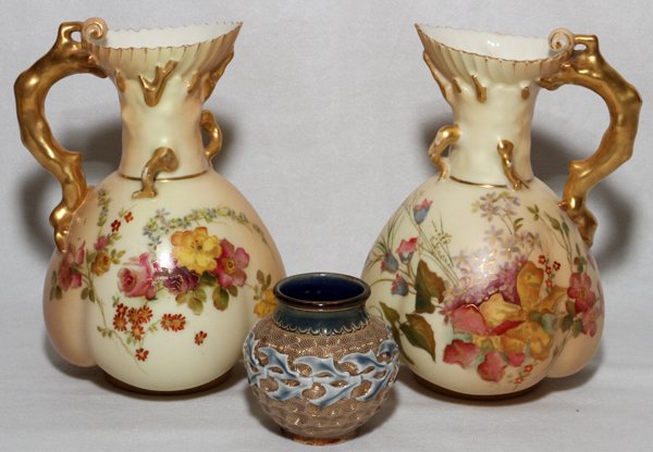 ROYAL WORCESTER PITCHERS & DOULTON VASE, 19TH C: ROYAL WORCESTER PORCELAIN PITCHERS & DOULTON LAMBETH BUD VASE, 19TH C., THREE PIECES, H 6" & 2 1/2":Including 2 Royal Worcester porcelain pitchers, H.6 1/4", and 1 Doulton Lambeth bud vase with blue u