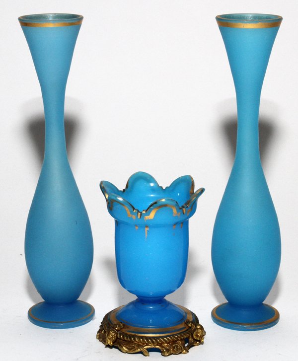 BLUE SATIN GLASS BUD VASES C.1880, GLASS VASE: BLUE SATIN GLASS BUD VASES, C. 1880, PAIR, H 9", & AN OPALINE GLASS VASE, H 4 1/2":All pieces are highlighted with gild banding; the opaline glass vase with French metal mounts. Three items total.