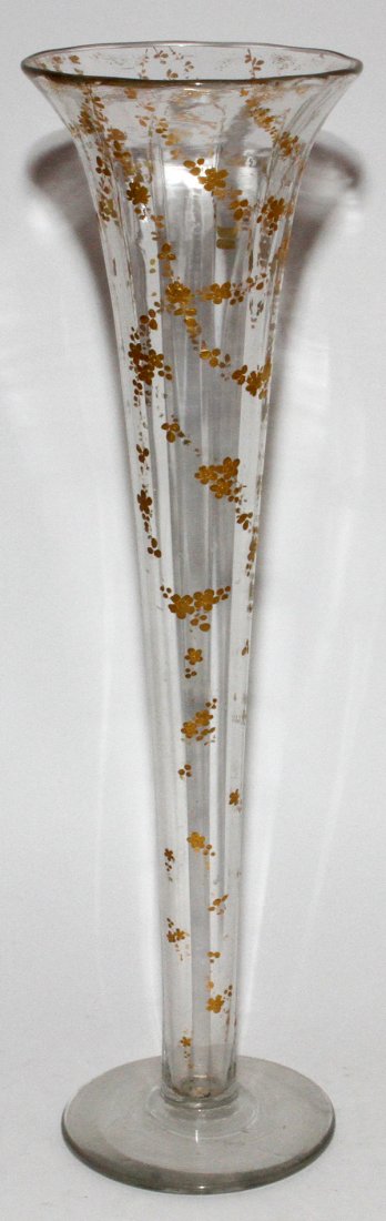 ENAMELED GLASS VASE, LATE 19TH C., H 23 1/2": ENAMELED GLASS VASE, LATE 19TH C., H 23 1/2":Hand-blown glass vase with subtle vertical striations, fired gold floral swags adorn.