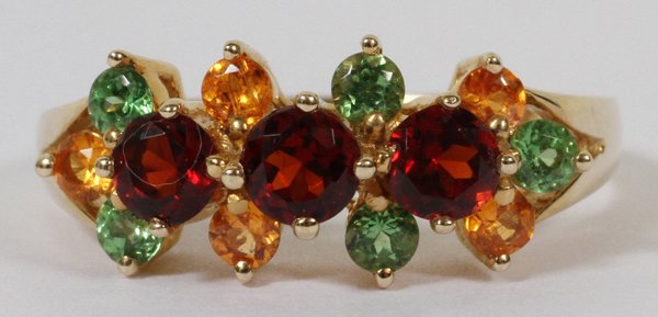 14KT YELLOW GOLD RING WITH GARNETS: 14KT YELLOW GOLD RING WITH GARNETS:Garnets and tourmalines.